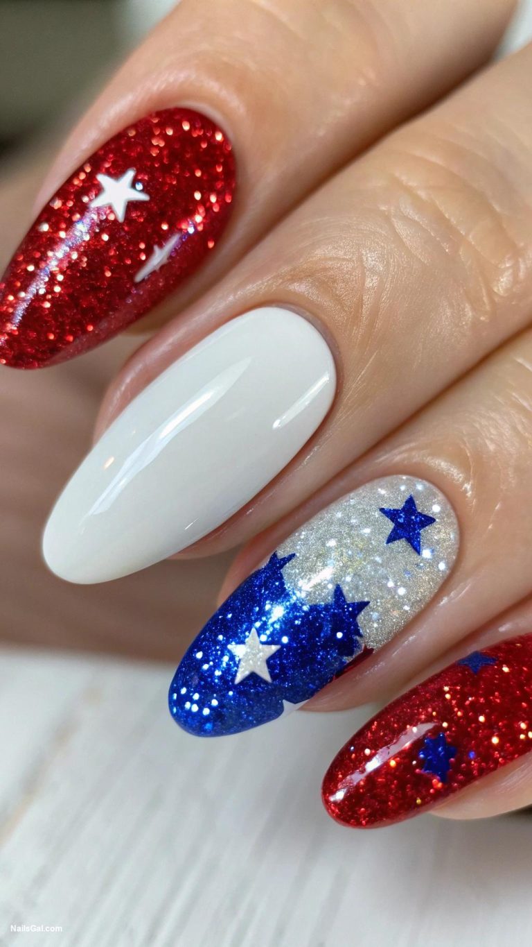 4th of July nails Sparkling Independence Use of sparkly gel polish to create a luxe look with red and blue glitter over a white base