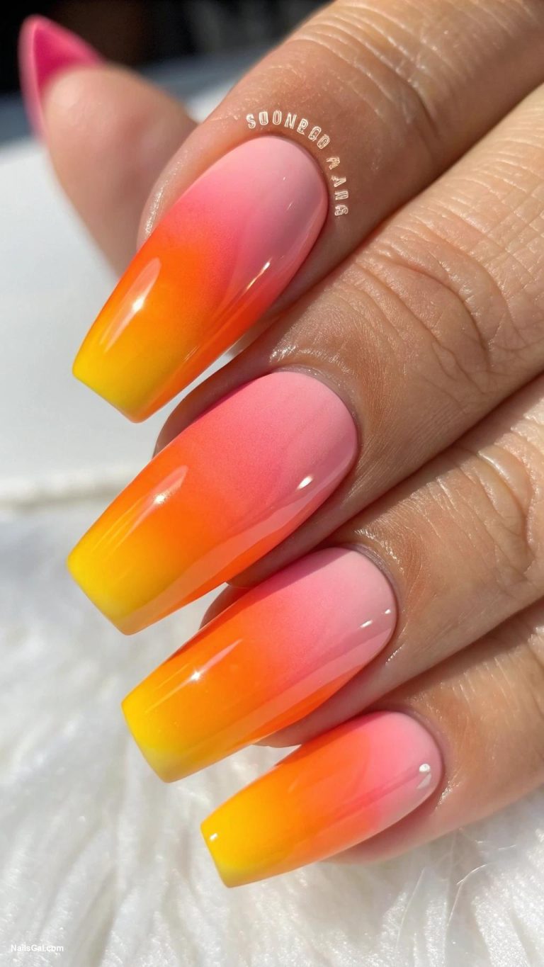 best summer nail colors Sunset Ombre An ombre design featuring shades of orange pink and yellow for a sunset effect