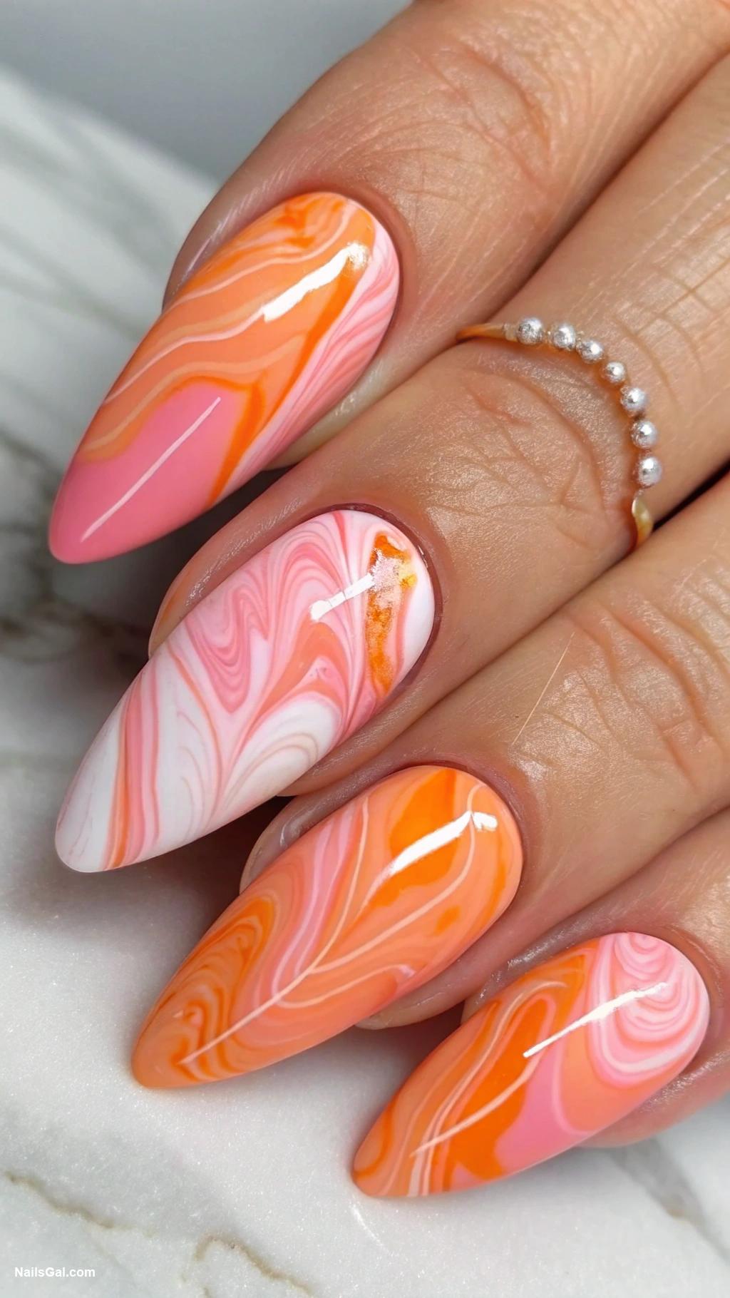 pink and orange nails Marble effect using pink and orange