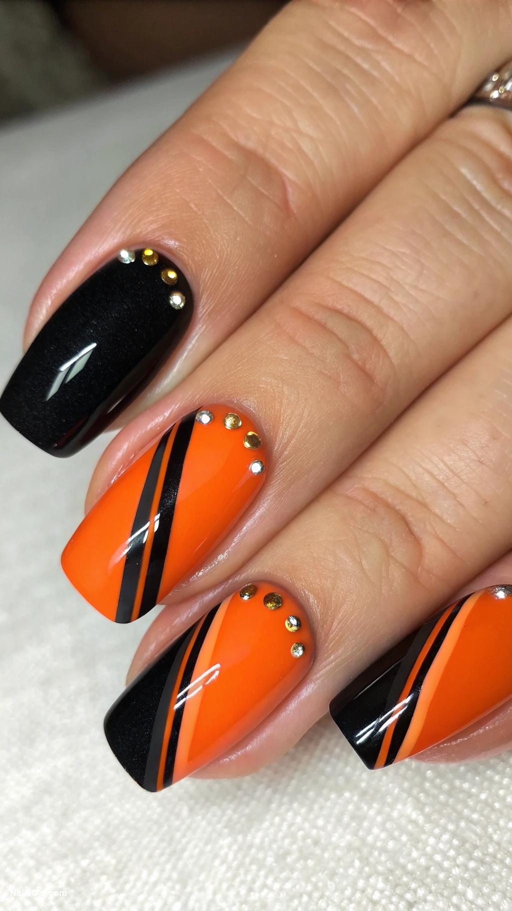 black and orange nails Half black half orange diagonal split