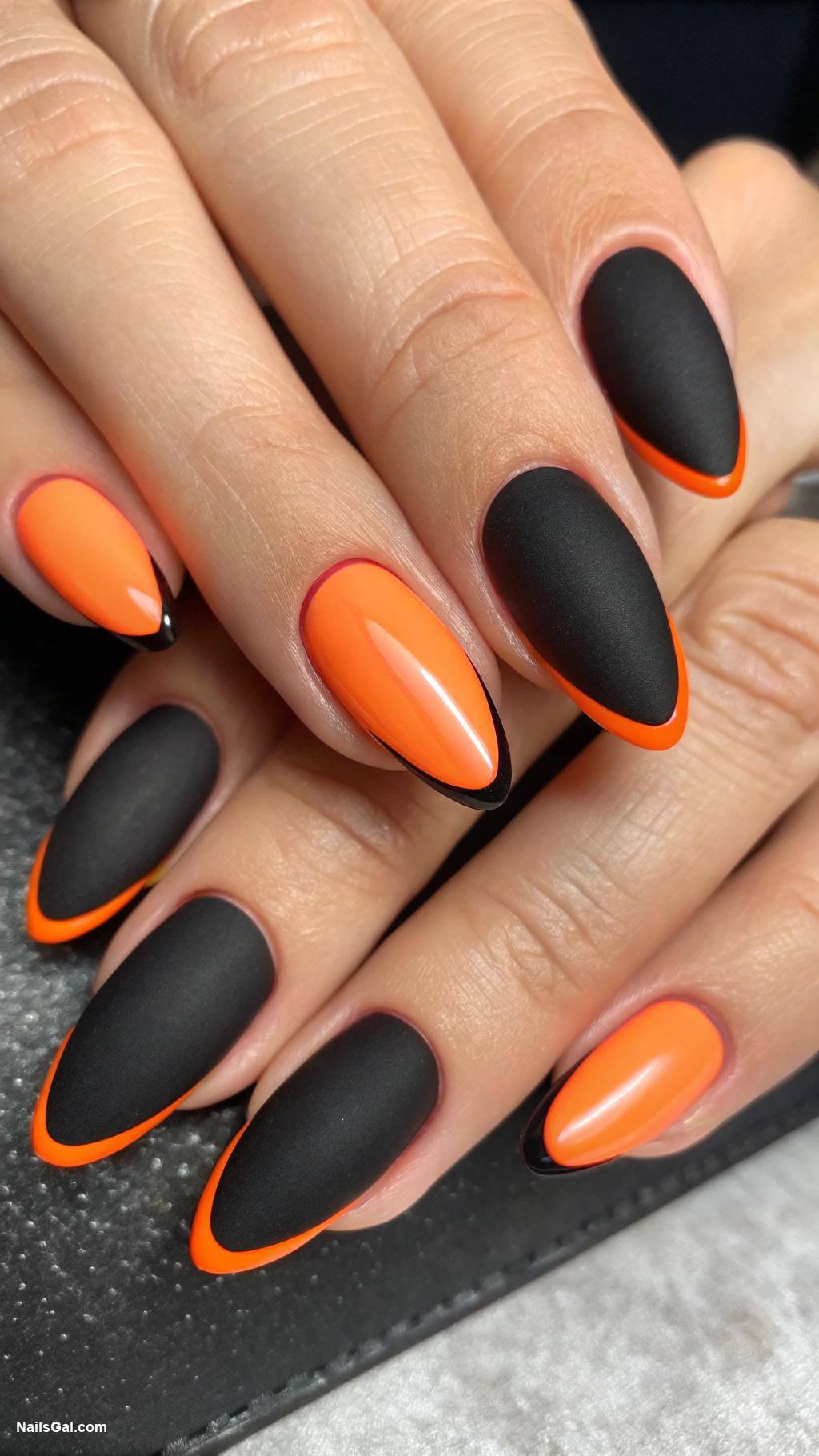 black and orange nails Matte black with glossy orange tips