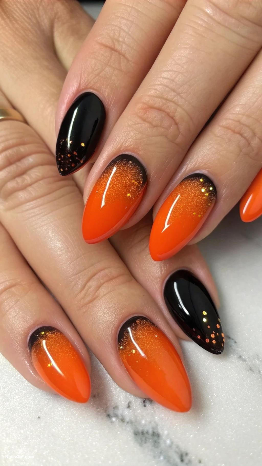 black and orange nails Orange ombre fading into black