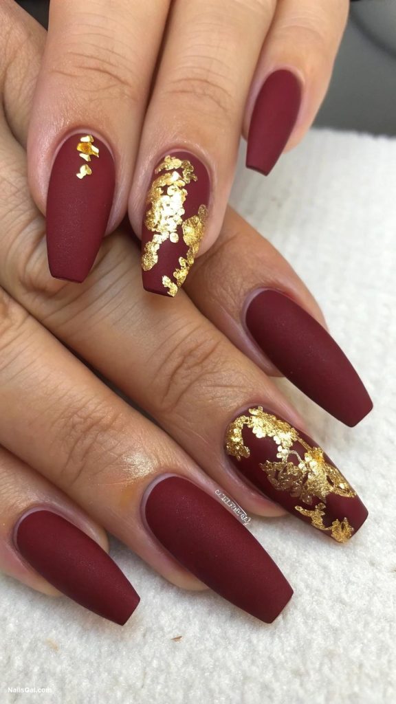 fall coffin nails Matte burgundy with gold foil accents