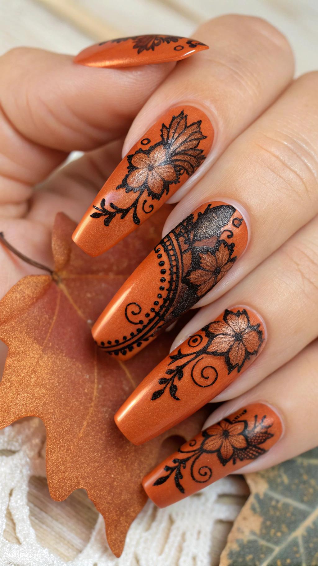 fall coffin nails Rust orange with black lace designs