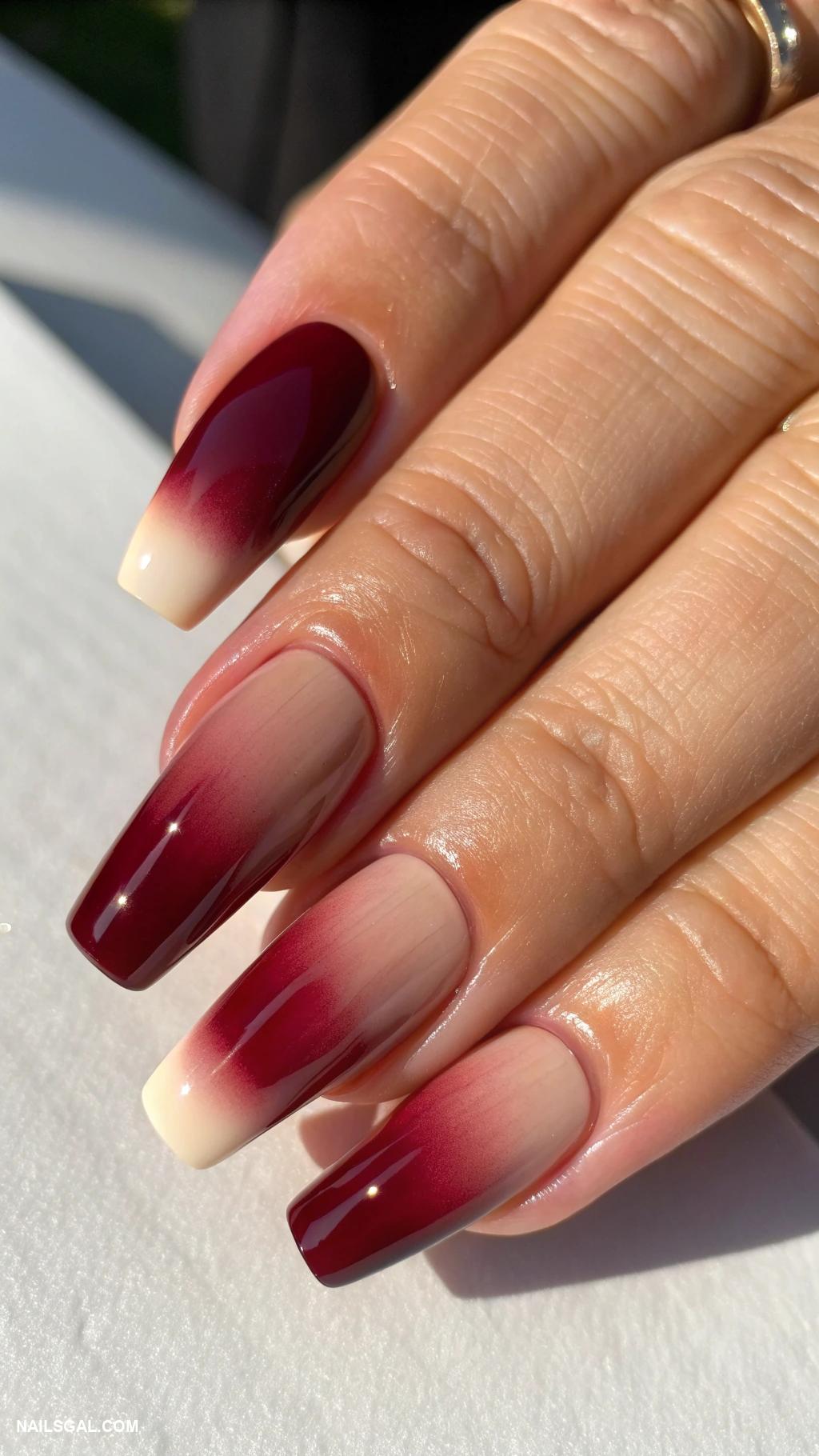 fall ombre nails Burgundy to nude cream gradient