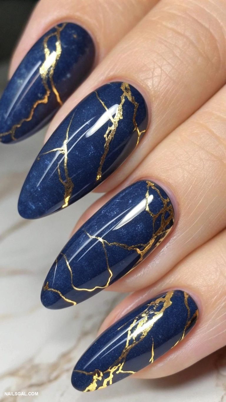 navy blue nails Navy blue marble effect with gold veins
