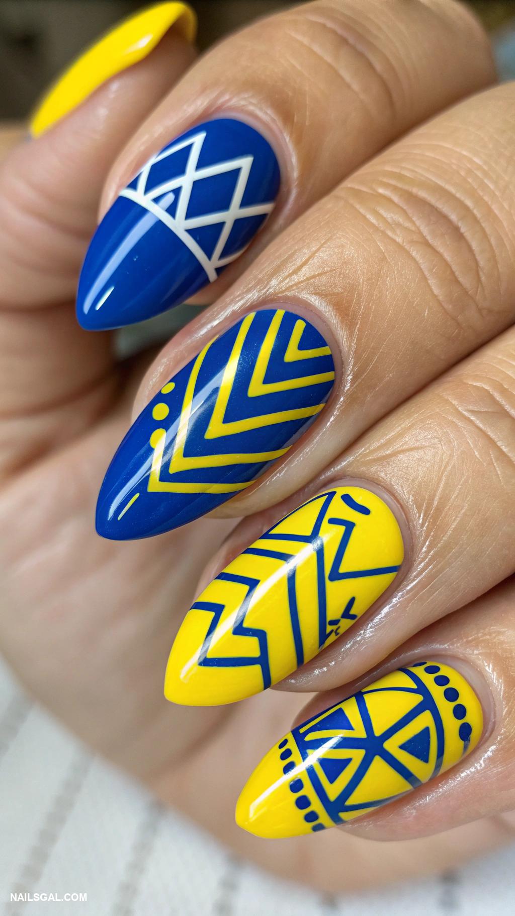 blue and yellow nails Geometric patterns featuring blue and yellow shapes