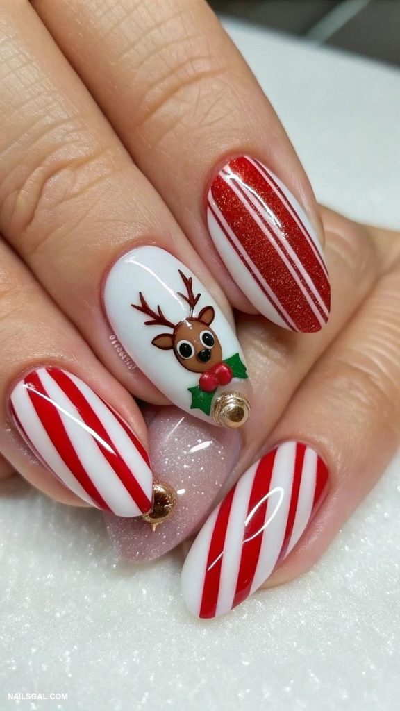 reindeer nails Holiday themed stripes with tiny reindeer charms