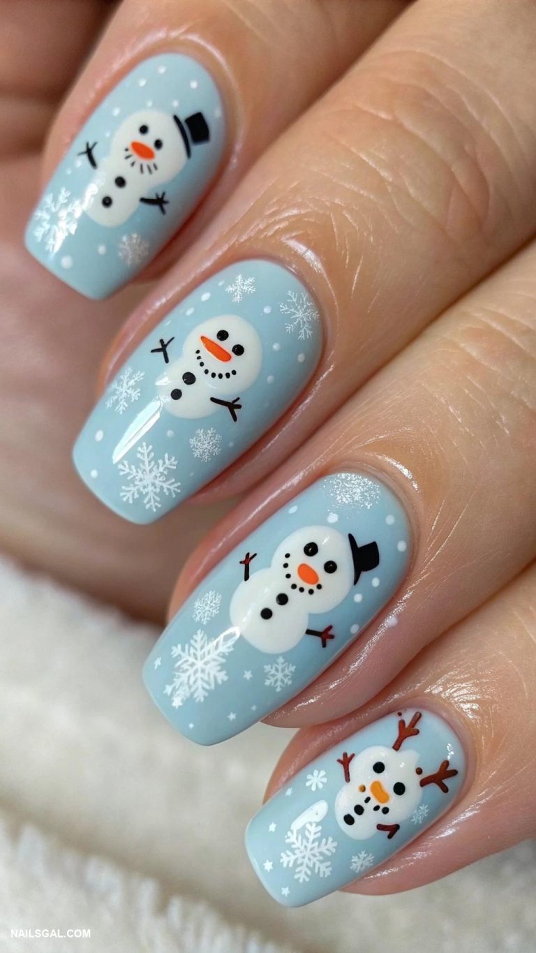 winter nail ideas Cute snowman faces on light blue