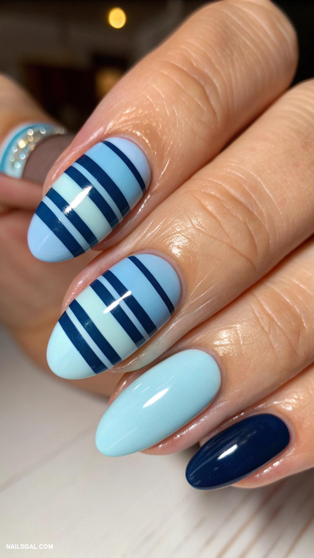 baby boy baby shower nails Striped nails in light and dark blue
