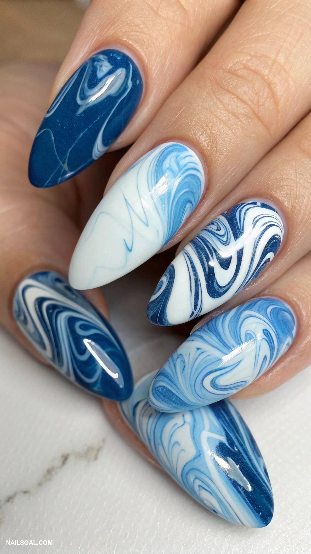 blue marble nails Swirling blue and white marble effect