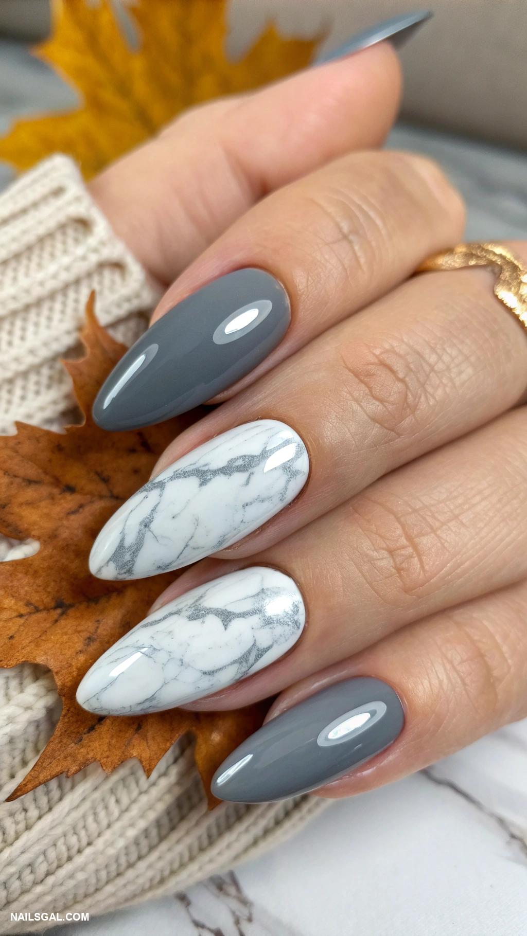 chrome autumn nails Slate gray chrome with marbled white design