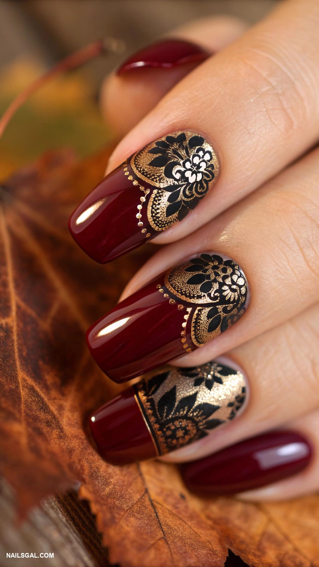 dark fall nails Burgundy with intricate lace patterns