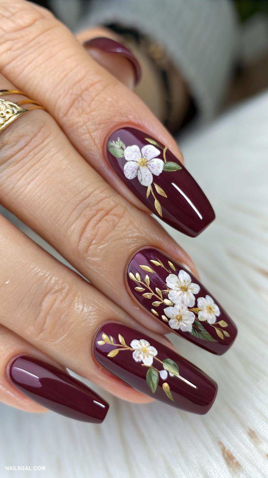 dark plum nails Dark plum with floral nail art