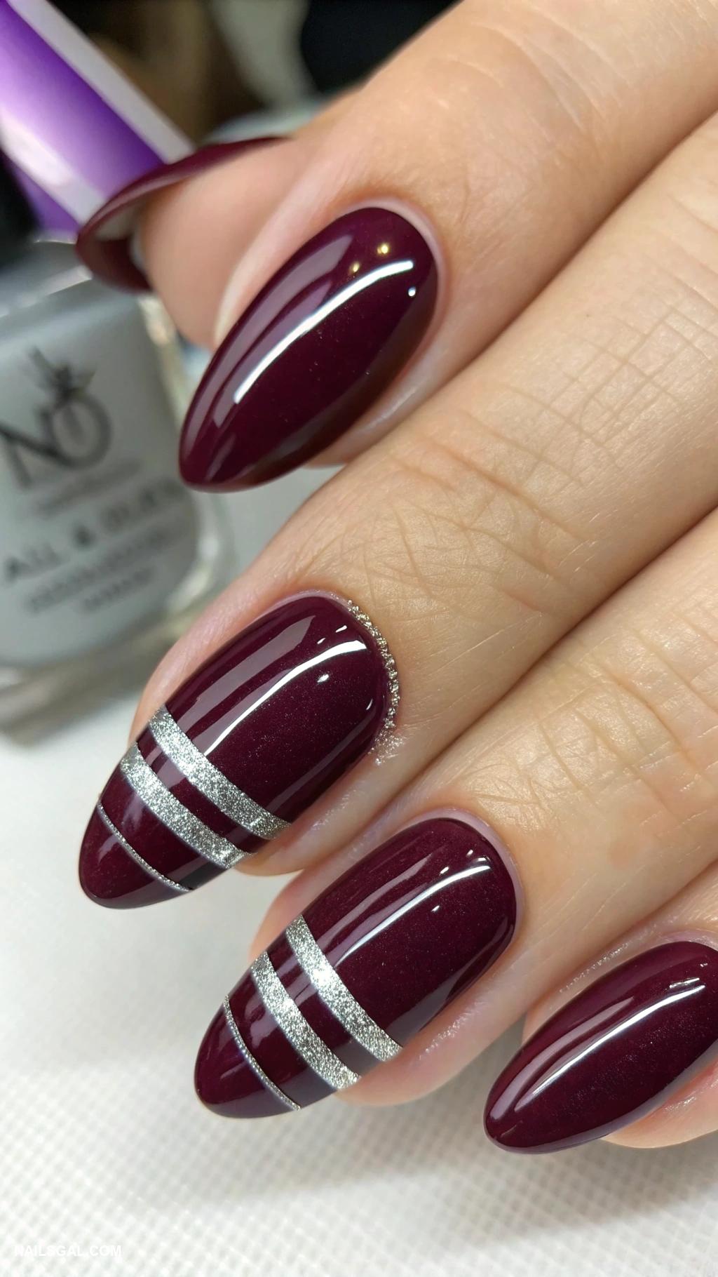 dark plum nails Glossy dark plum with silver stripes