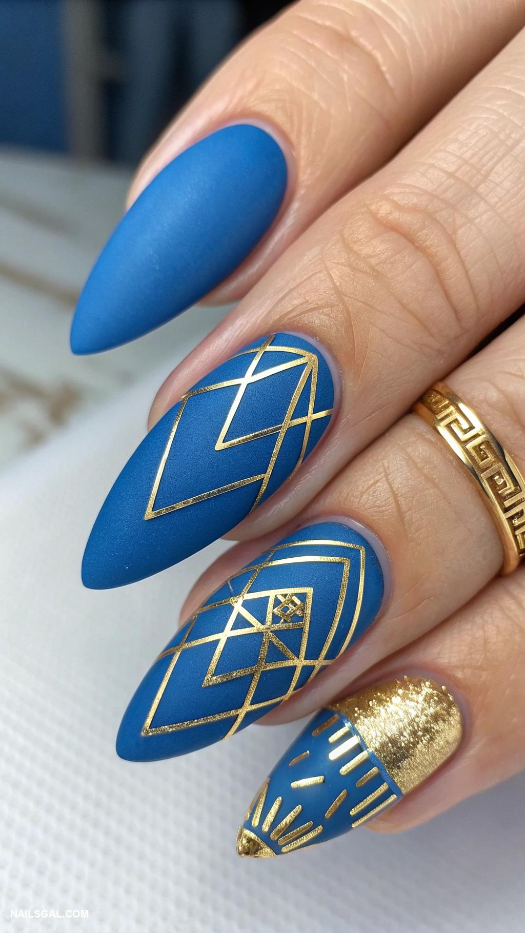 blue christmas nails Matte blue with shiny gold accents