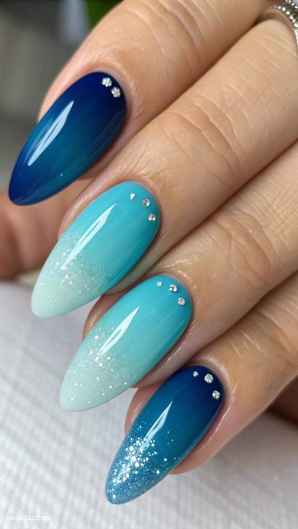 blue ombre nails Deep blue fading to light aqua tips