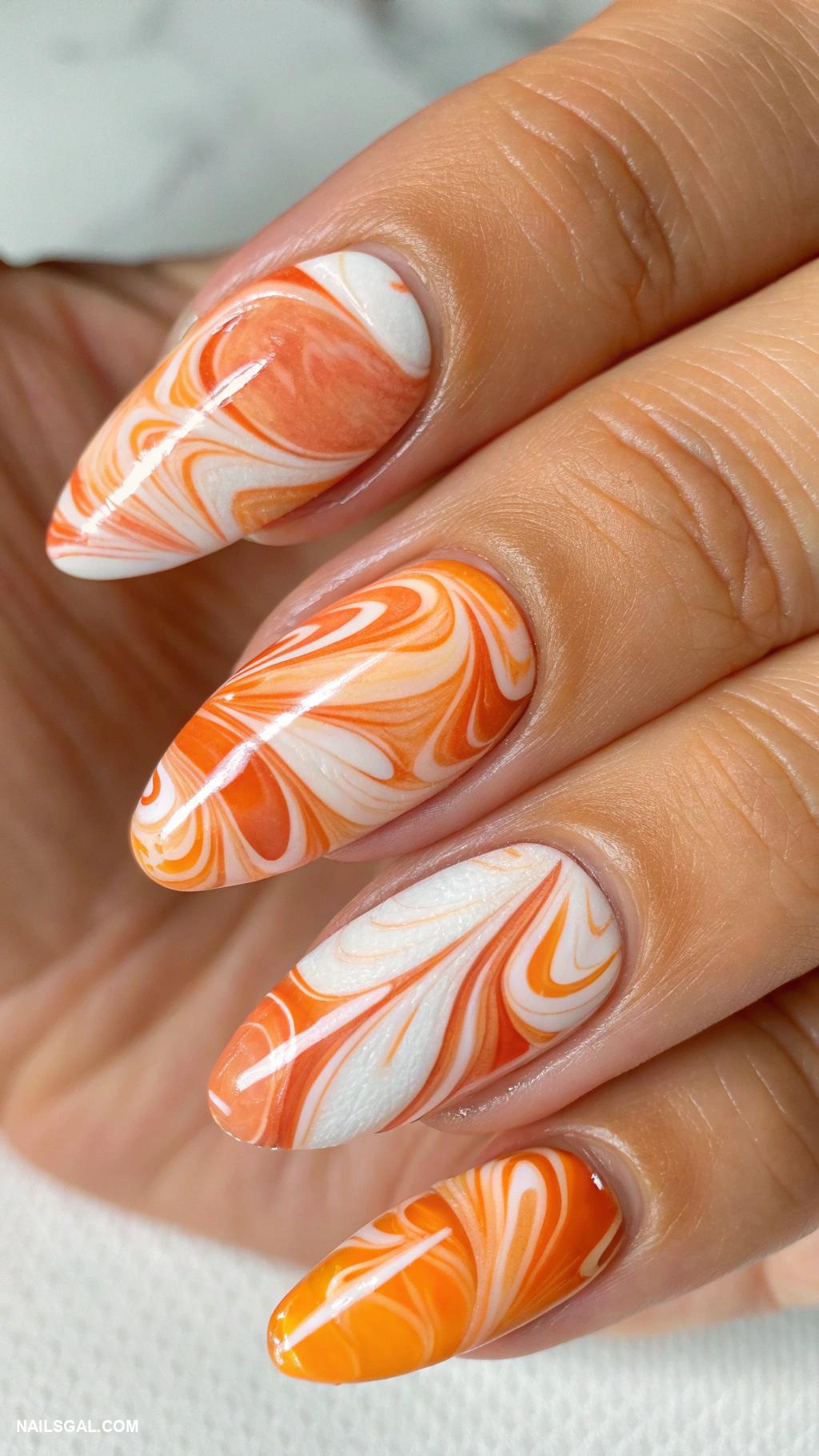 orange fruit nails Marble orange and cream swirls