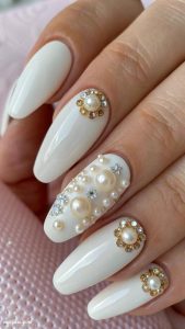 pearl white nails Pearl white with gemstone embellishments