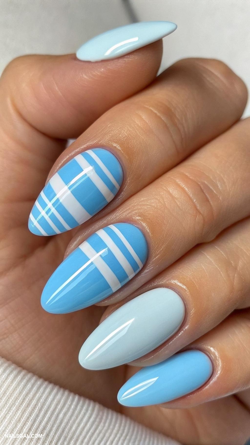 neutral acrylic nails Light blue with hand painted stripes